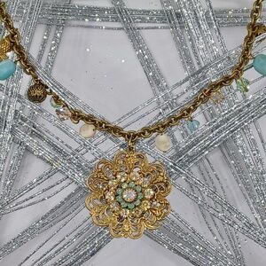 Liz Palacios medallion and charm necklace